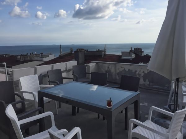 Tea on the terrace, overlooking the sea